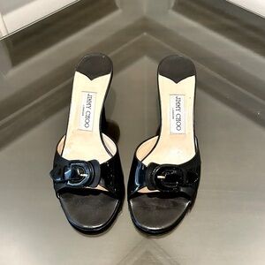 Jimmy Choo Vintage Black Patent Leather Mules with Buckle Detail.